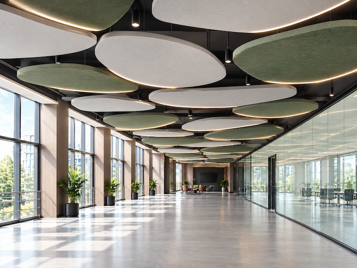 Modern office ceiling and open workspace designed for acoustic comfort